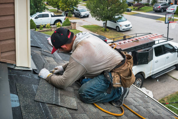 Professional Flat Roof Repair technician working in Idlewild, MI